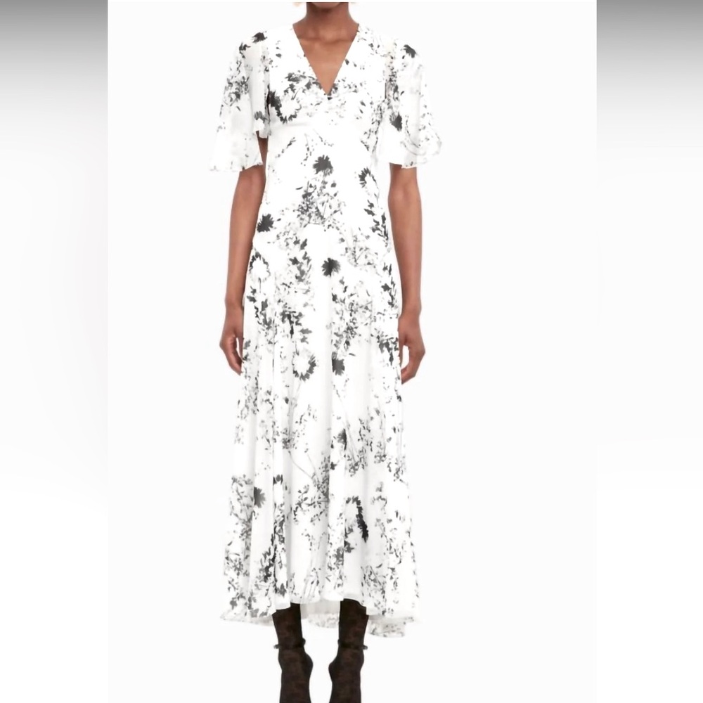New / never worn. Size - 4US/8UK